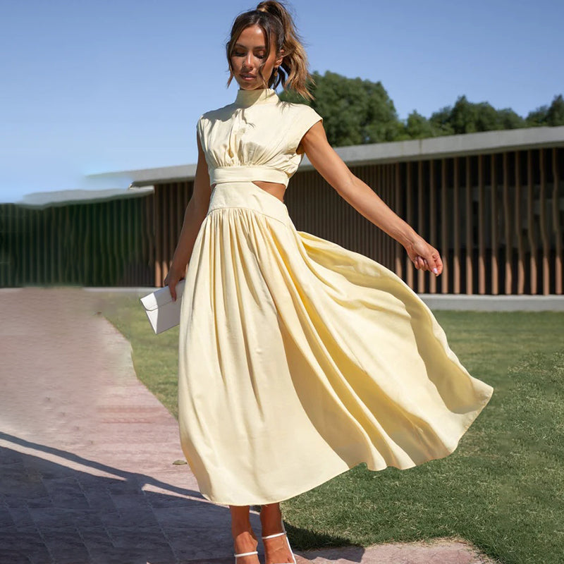 Comfortable and chic women's pleated midi dress with cap sleeves. Perfect elegant summer dress for various occasions.