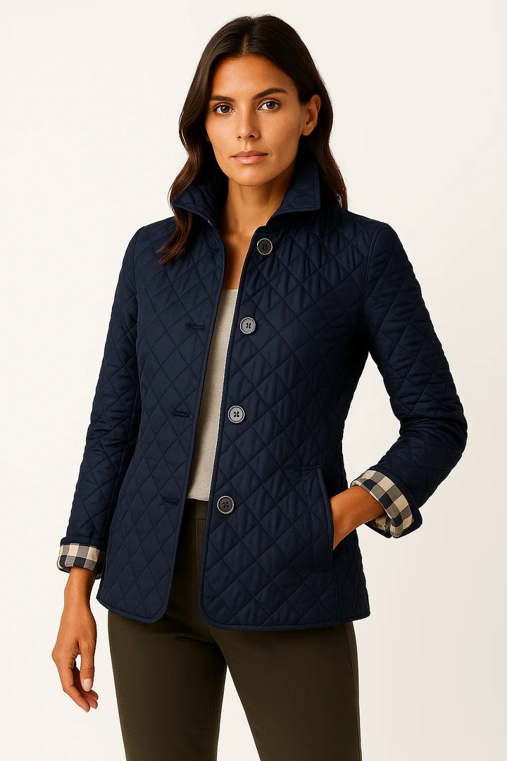 Women's chic quilted puffer jacket, offering effortless warmth and style in blue.