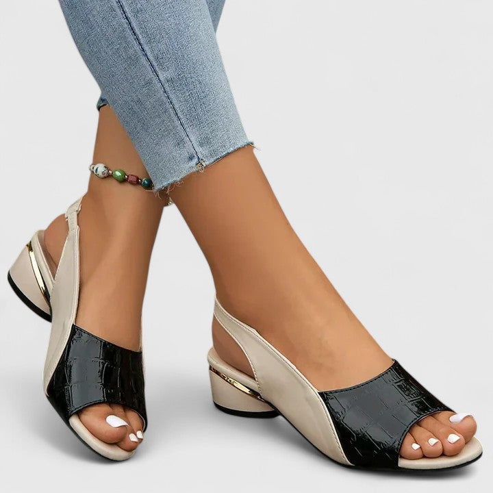Chic red women's open-toe flat sandals with adjustable buckle for stylish summer footwear & everyday comfort.