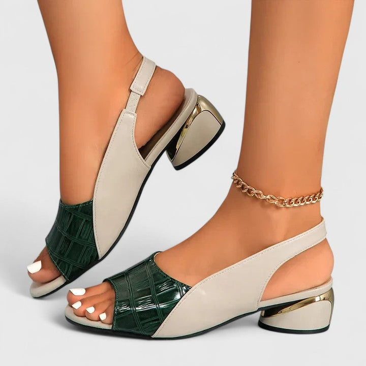 Comfortable black women's open-toe sandals, perfect for versatile summer style & everyday wear. Flat design.