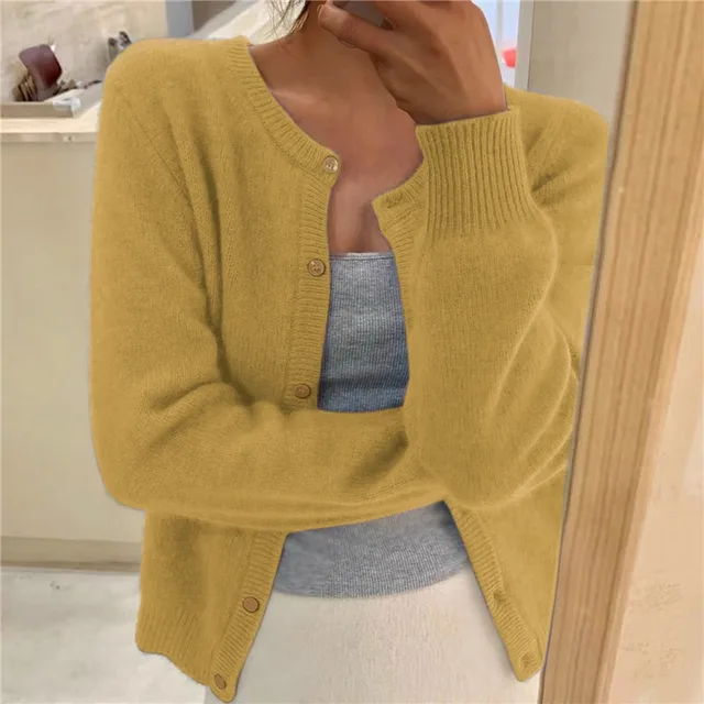 Women's solid knit cardigan, comfortable & versatile for all-season layering fashion.