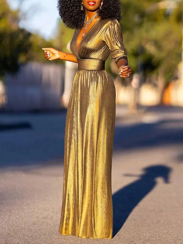 Fashionable women's one-piece jumpsuit in striking green and gold.