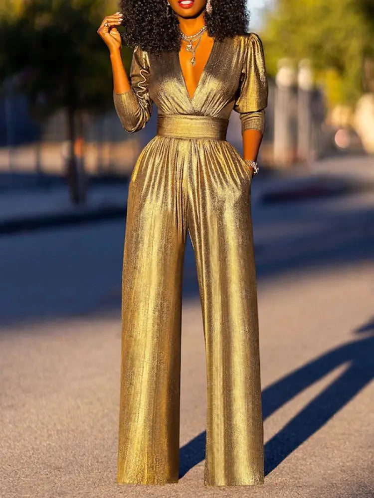 Party-ready shiny jumpsuit for women in gold and green.