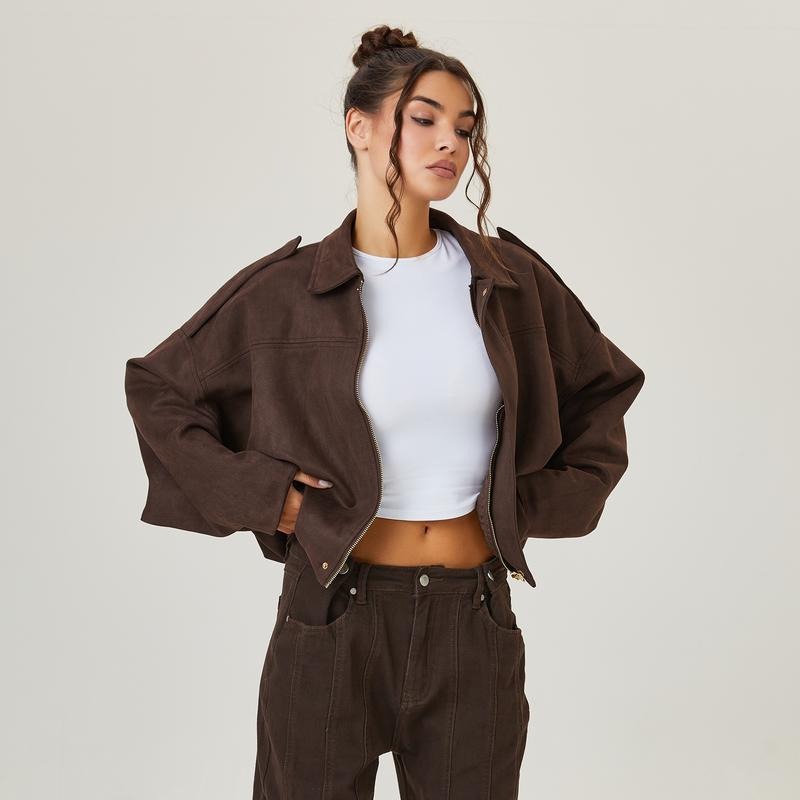 Close-up of the soft faux suede texture on the Chic und Stil women's bomber jacket
