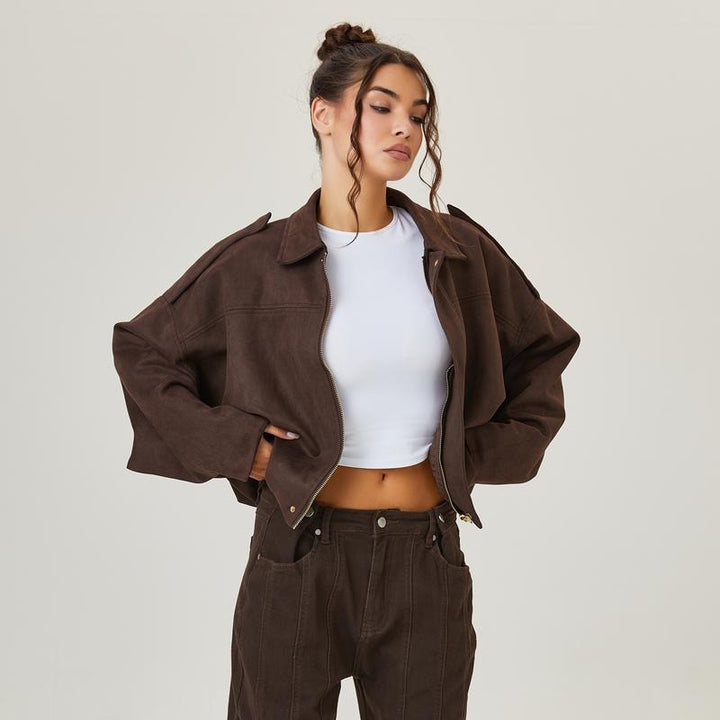 Close-up of the soft faux suede texture on the Chic und Stil women's bomber jacket