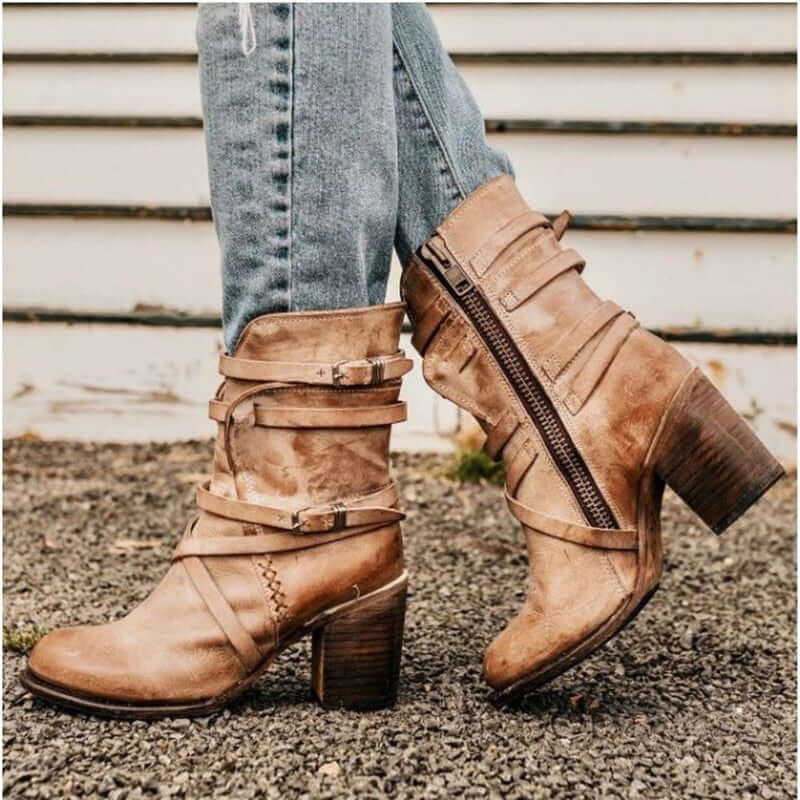 Chic women's ankle boots with multiple buckle straps and a comfortable block heel, perfect for fall fashion.