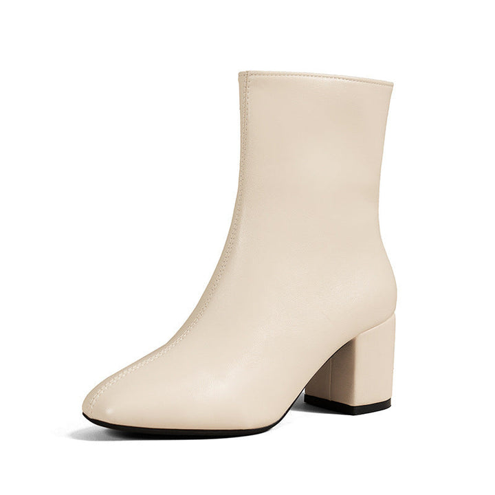 Fashionable women's ankle boots showcasing a sturdy block heel, ideal for versatile styling and fall trends.