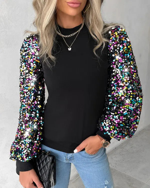 Elegant women's blouse with comfortable balloon sleeves and subtle sequin accents, ideal for everyday or office wear.