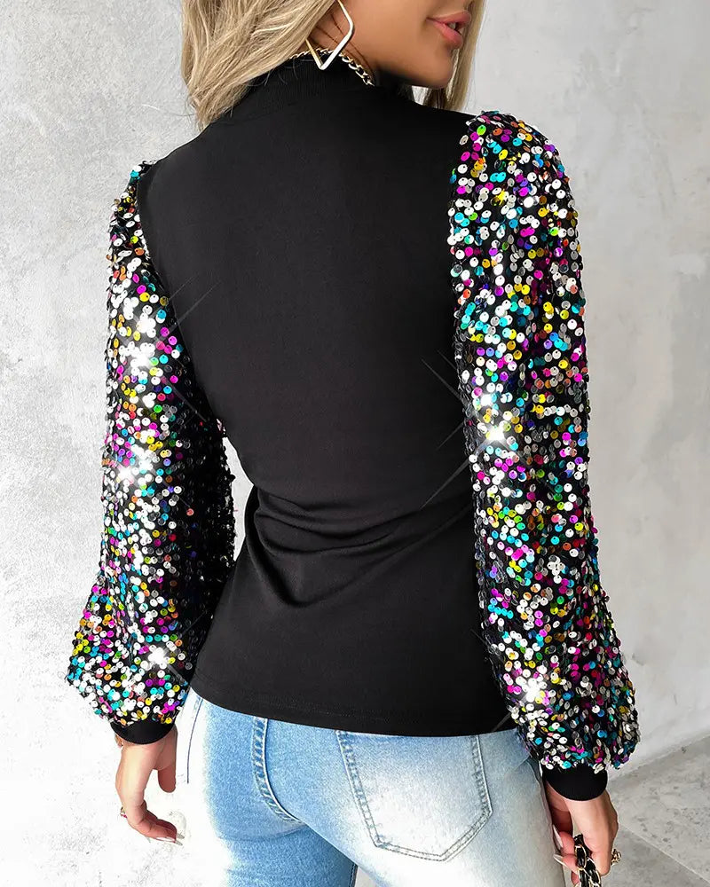 Casual elegant women's fashion blouse with chic balloon sleeves and eye-catching sequin details, a versatile long-sleeve top.