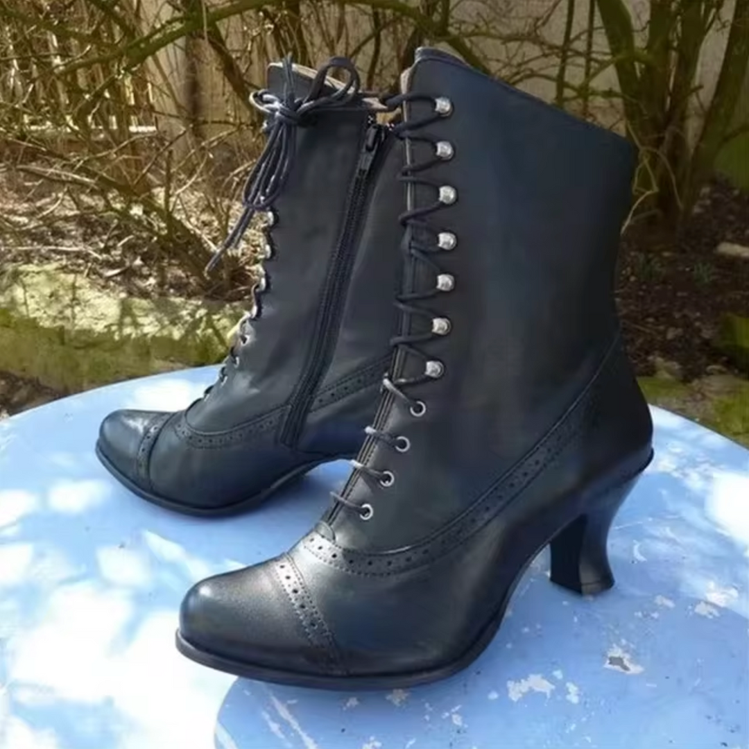 Stylish women's pointed toe lace-up platform boots, black faux leather, perfect trendy retro classic fashion footwear.