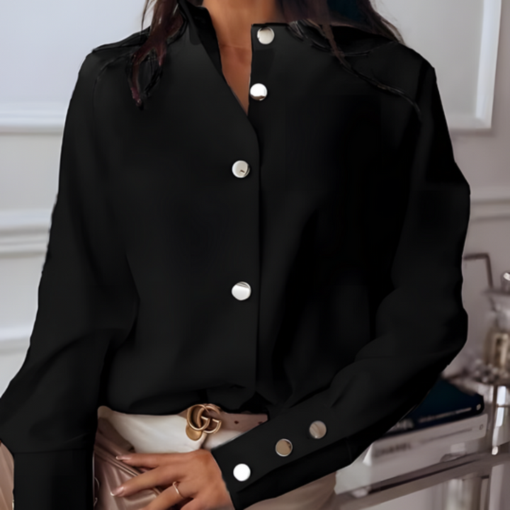 Chic women's black quilted button-down shirt, perfect for versatile everyday styling & layering. Long sleeve comfy top.