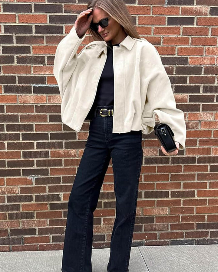 Side view of a stylish women's collared bomber jacket, perfect for versatile outerwear.