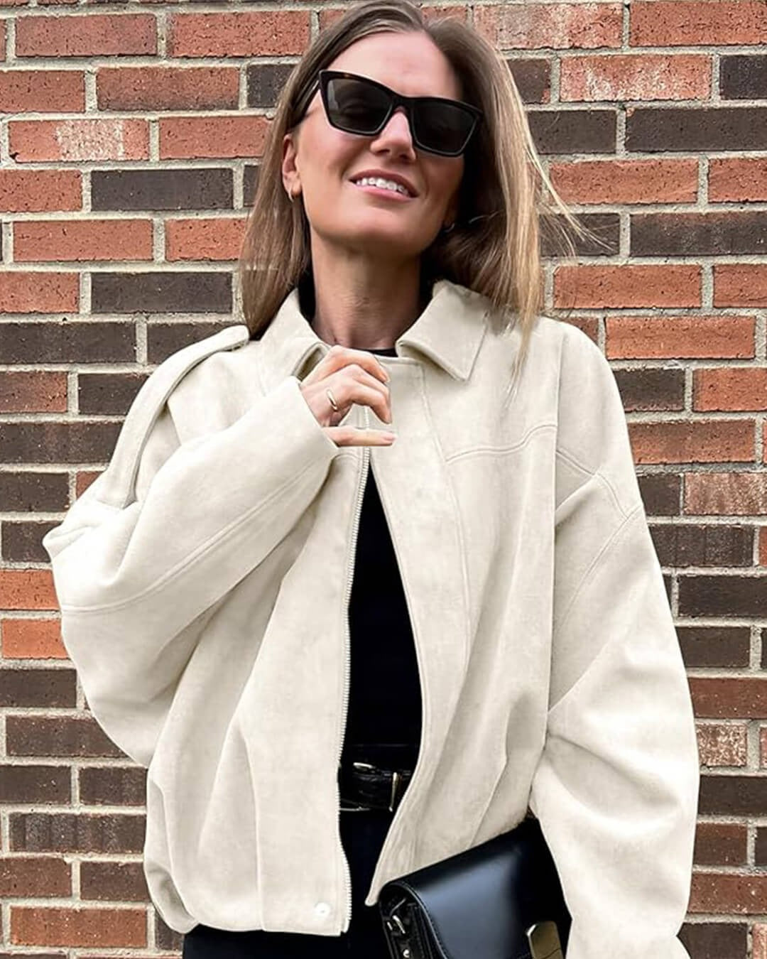 The ultimate women's chic bomber jacket with collar, providing versatile & stylish comfort.