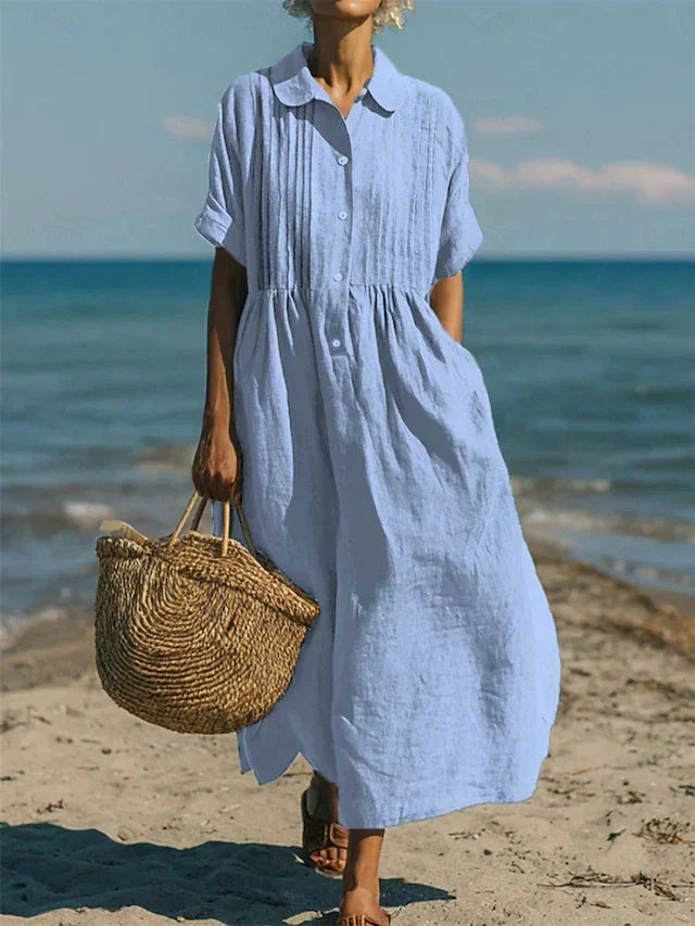 Elegant women's midi dress with a collar & button front; versatile for casual or day wear.