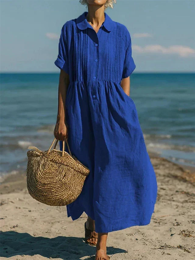 Relaxed fit women's summer midi dress, collared, offering comfortable, chic style.