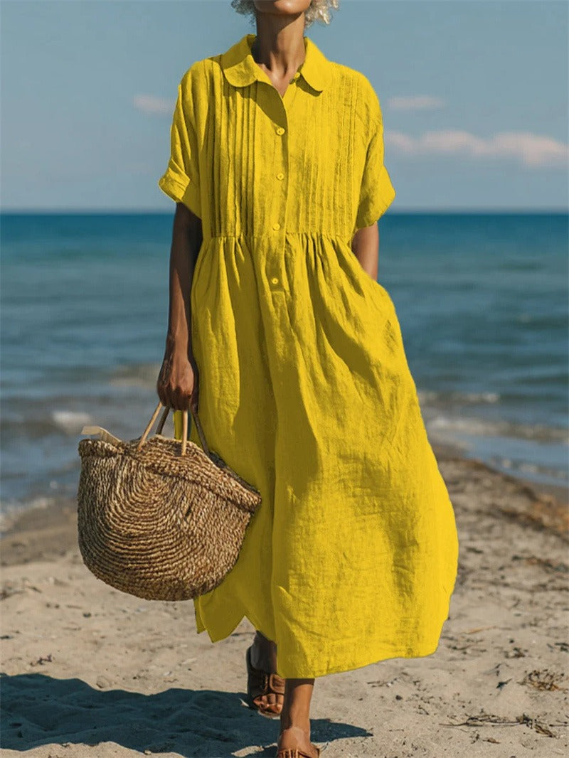 Stylish women's midi dress, collared with buttons, offering an elegant and casual blend.