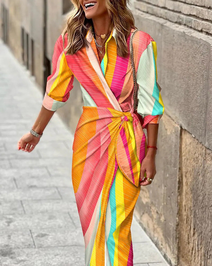 Relaxed fit women's collared wrap dress, perfect for a chic and breezy summer day.