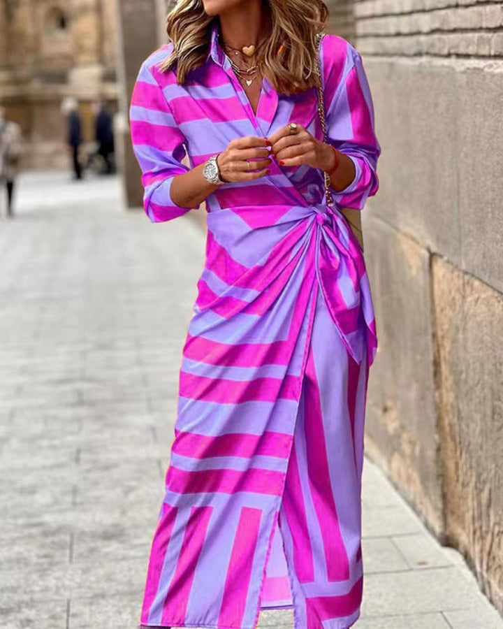 Flowy women's summer wrap dress featuring a modern collar and flattering fit.