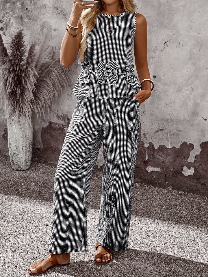 Chic women's embroidered wide-leg two-piece set for versatile casual wear. Matching top and pants.