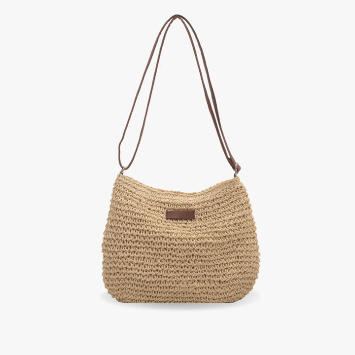 Chic women's everyday shoulder crossbody bag in a versatile design, perfect for casual or elegant summer outfits.