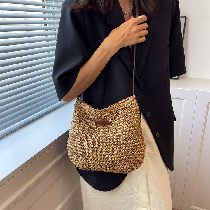 Versatile women's everyday shoulder bag, easily converts to crossbody. Chic accessory for any casual or elegant look.