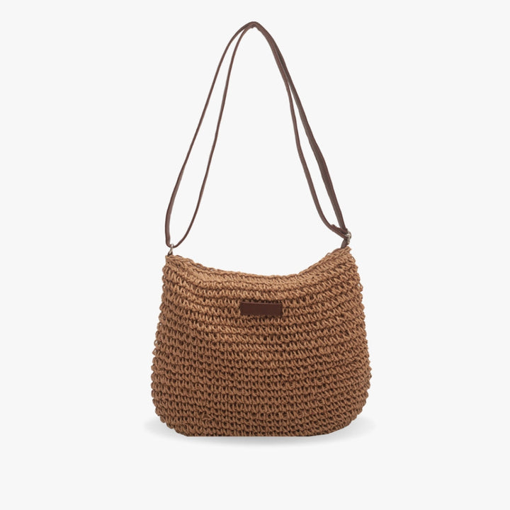 Modern women's shoulder crossbody bag, chic and practical for everyday use. Adds elegance to casual summer ensembles.