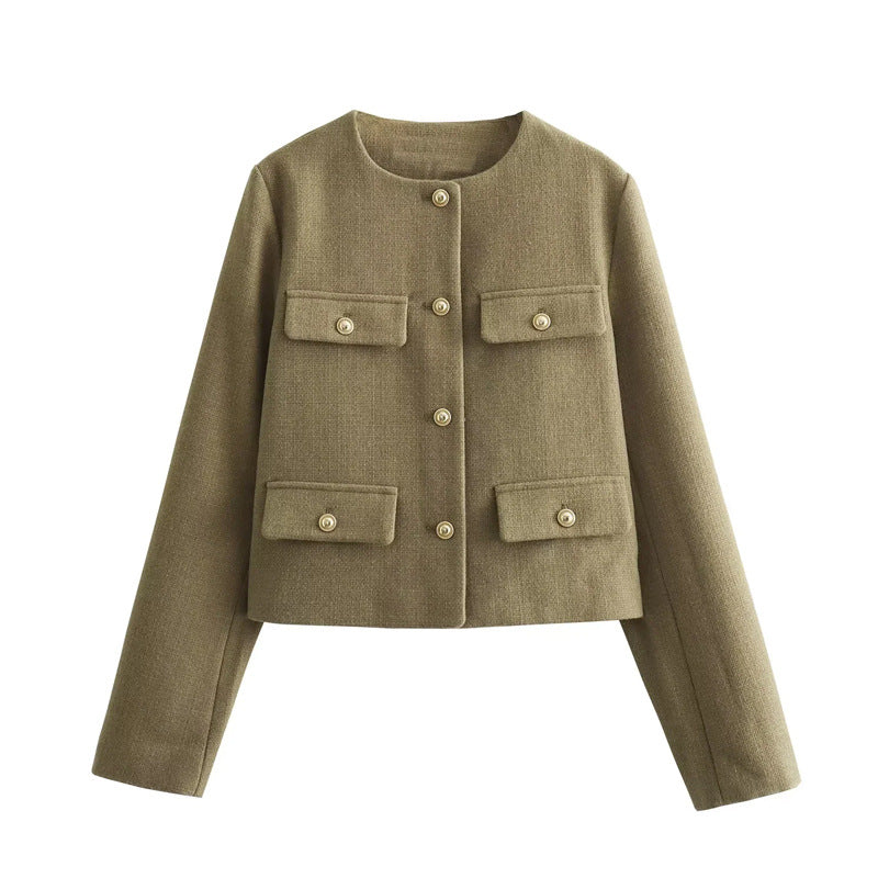 Modern women's gold-button cropped blazer. Versatile tailored jacket for workwear and evening events.