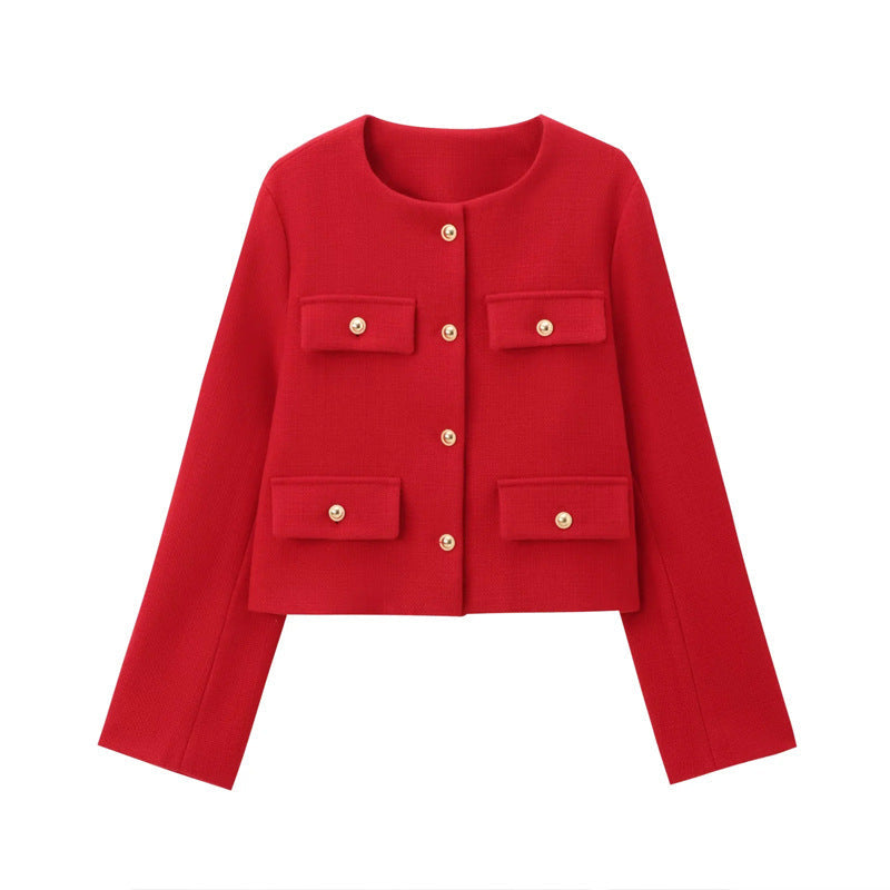 Elegant women's cropped jacket with long sleeves and chic gold buttons. Smart casual day to night fashion.