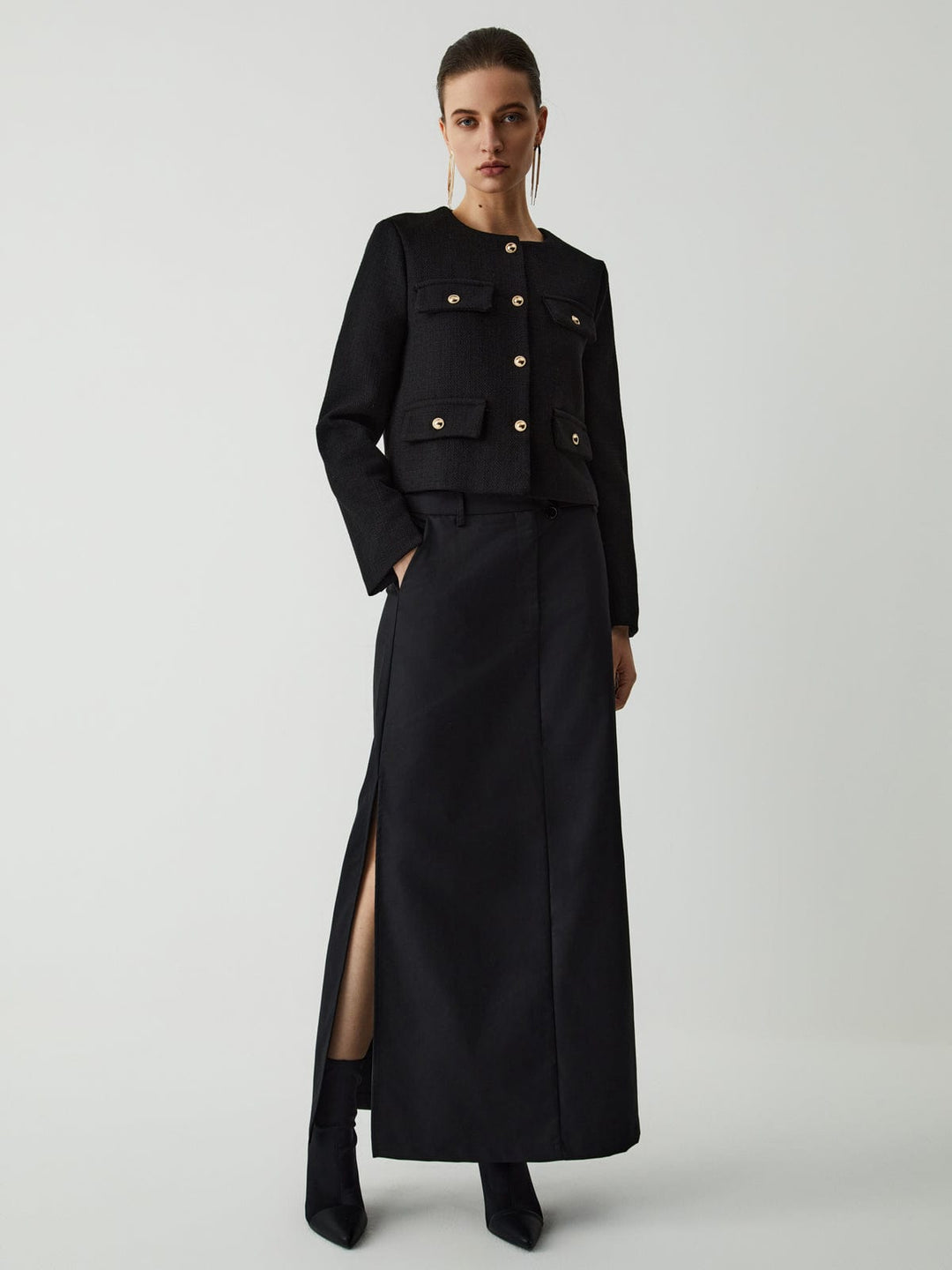 Versatile women's cropped jacket with elegant gold buttons. Smart day to night long sleeve outerwear.