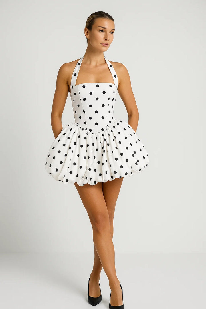 Chic women's halterneck mini dress with voluminous skirt, perfect for summer parties & events.