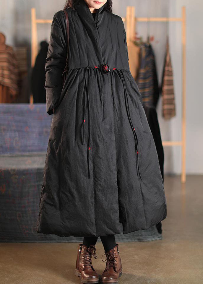 Women's warm winter jacket featuring a high collar, elegant button front, and a chic design for cold weather.