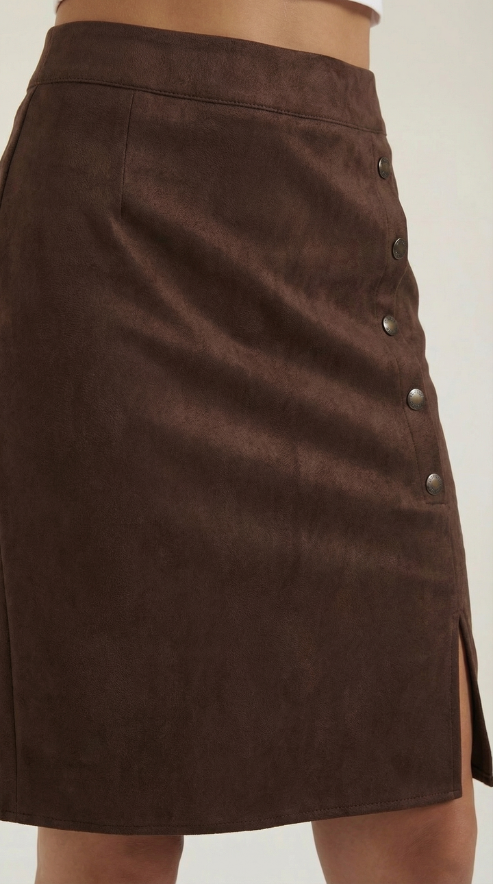 Flattering high-waisted women's mini skirt, designed with chic button details.