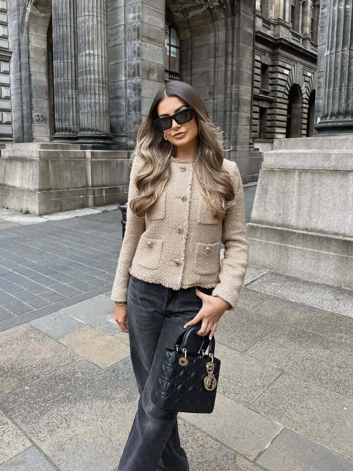 Stylish women's khaki cropped jacket, a chic outerwear piece with pockets for elevated fall style.