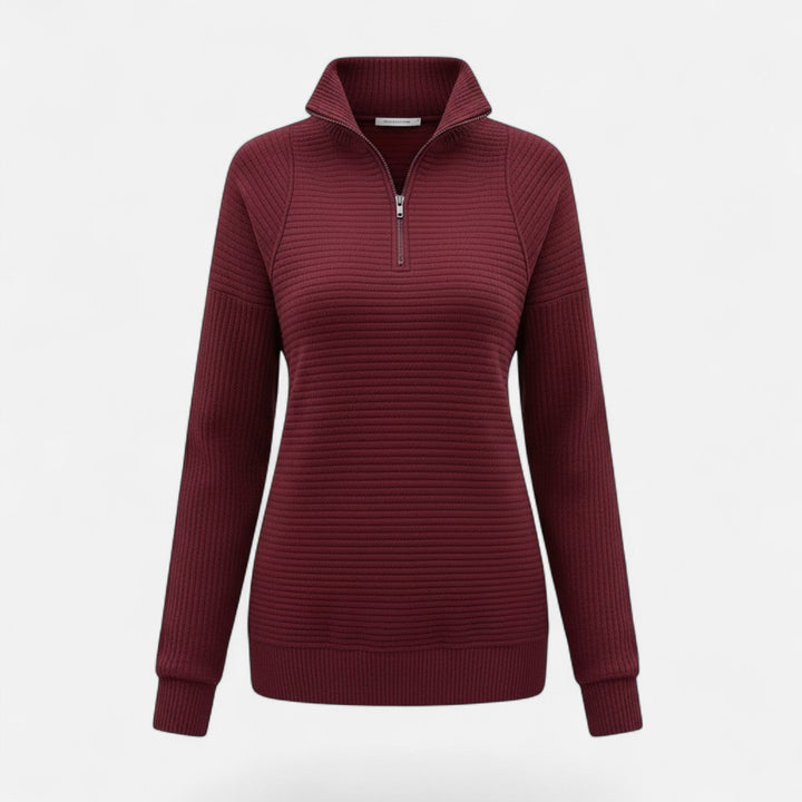 Chic knit women's sweater with a zipper stand-collar, ideal for spring fashion and layering.