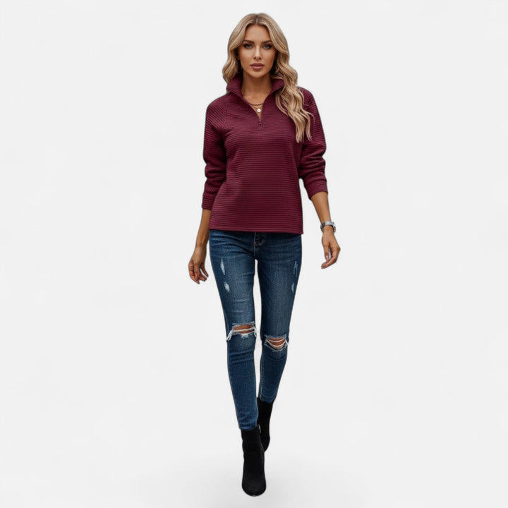 Versatile women's long sleeve knit sweater, stand-collar, half-zip detail, for casual wear.