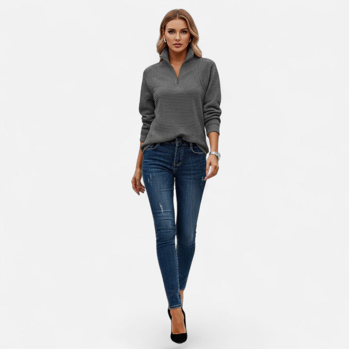 Women's long sleeve knit sweater, stand-collar with zipper, a versatile piece for any season.