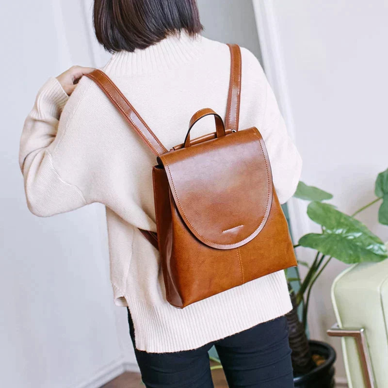 Chic women's leather backpack, perfect for daily use, travel & work. Stylish & functional shoulder bag design.