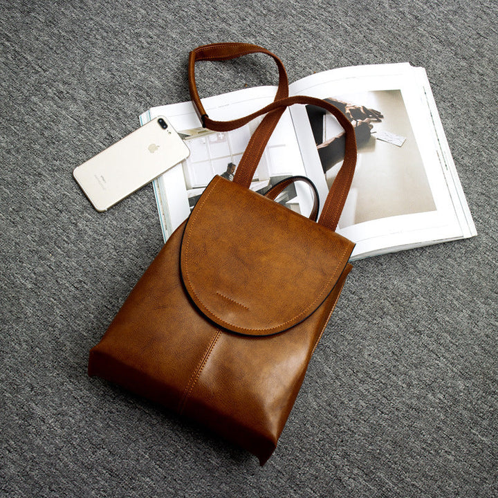 Versatile women's leather backpack with multiple compartments. Durable & functional for daily wear or travel.