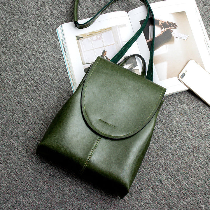 Stylish women's leather backpack, detailed view showing its chic design and practical features for daily use.