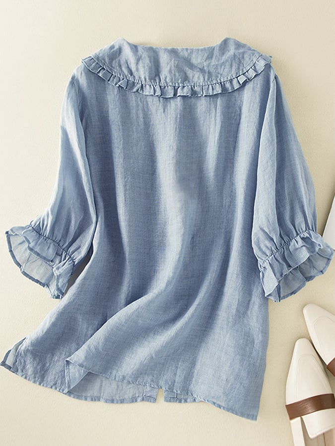 Stylish women's loose ruffled neck blouse with Peter Pan collar, great for casual yet chic wear.