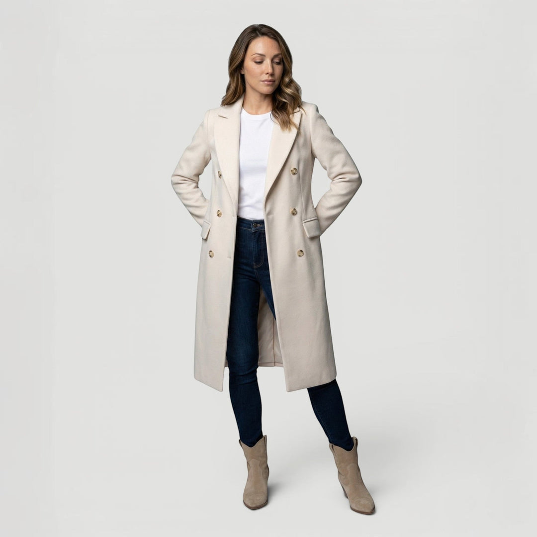 Fashionable women's outerwear: a versatile double-breasted minimalist jacket for elegant layering.