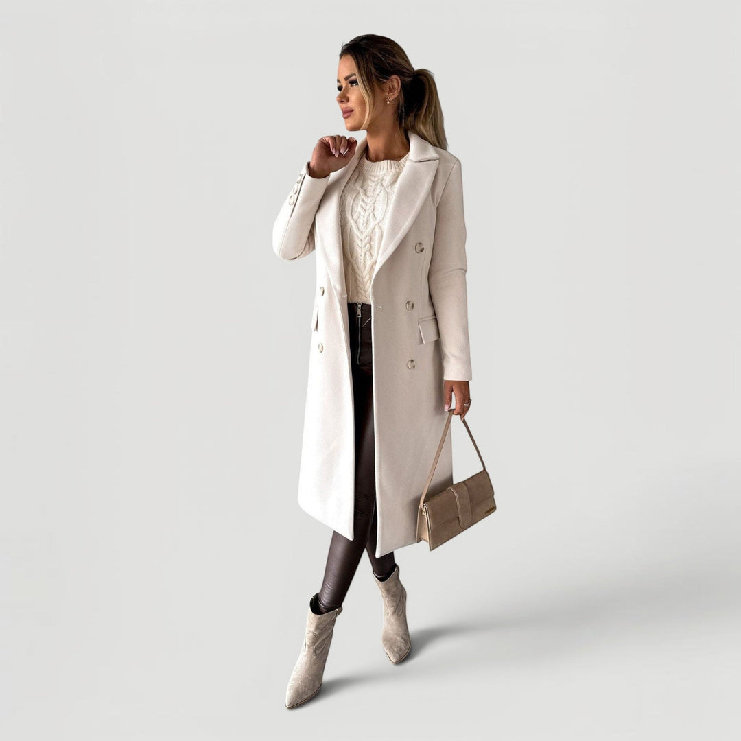 Stylish women's double-breasted jacket. A minimalist design perfect for chic everyday wear.