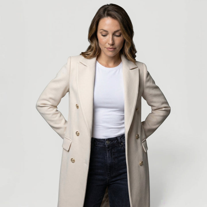 Chic and elegant women's double-breasted minimalist jacket, perfect for versatile everyday styling.