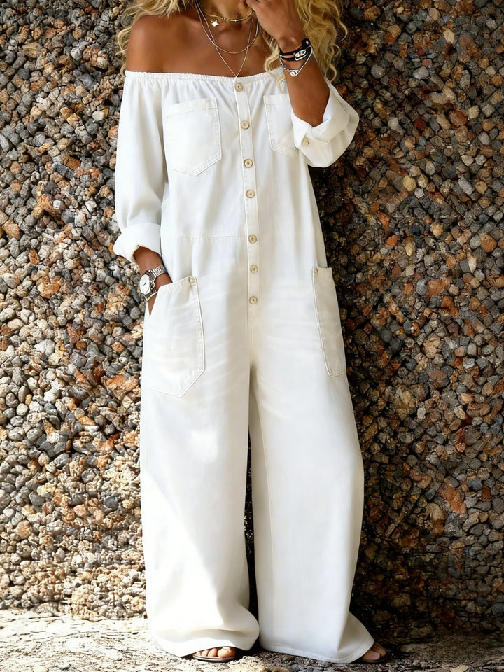 Women's chic off-shoulder jumpsuit with a button-front design and handy pockets, a versatile piece for casual fashion.