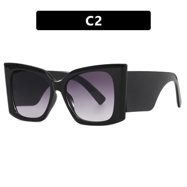 Trendy women's oversized cat-eye sunglasses. Stylish plastic frame eyewear, offers essential UV protection.