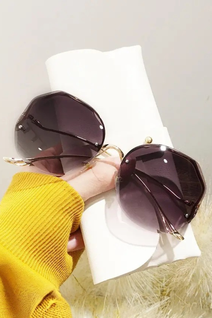 Classic oversized rimless gradient sunglasses for women, updated for a modern and chic fashion look.