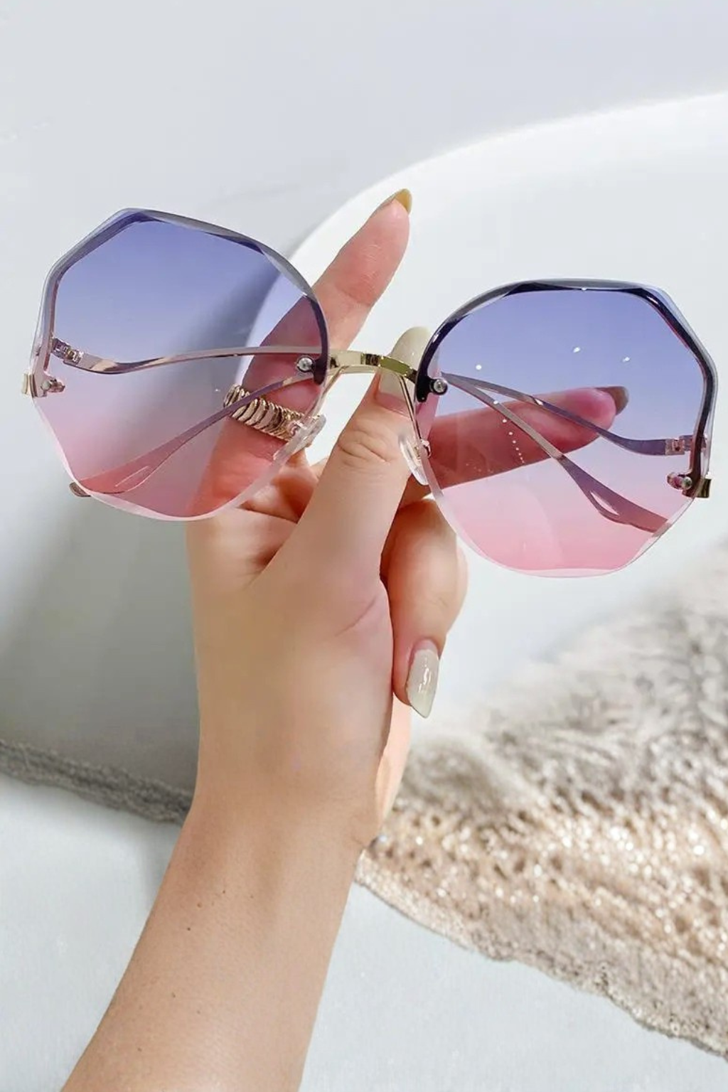 Trendy oversized rimless gradient sunglasses for women, ideal chic eyewear for fashion-forward looks.