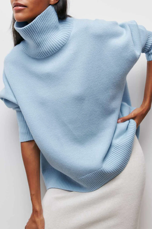 Chic women's oversized turtleneck sweater, perfect for cozy fall & winter fashion. Relaxed fit pullover comfort.