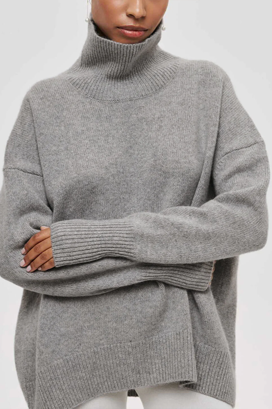 Comfortable women's oversized turtleneck pullover, perfect for layering during chilly fall and winter days.