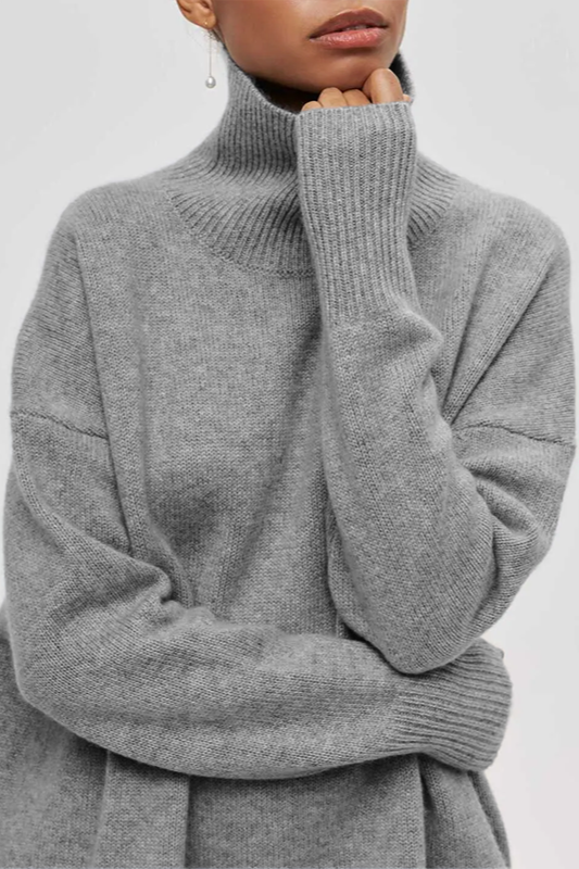 Elegant women's oversized turtleneck sweater, a chic and cozy pullover for sophisticated fall winter style.